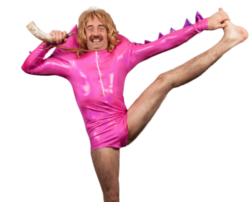 Cian Kinsella wearing a pink latex dinosaur suit